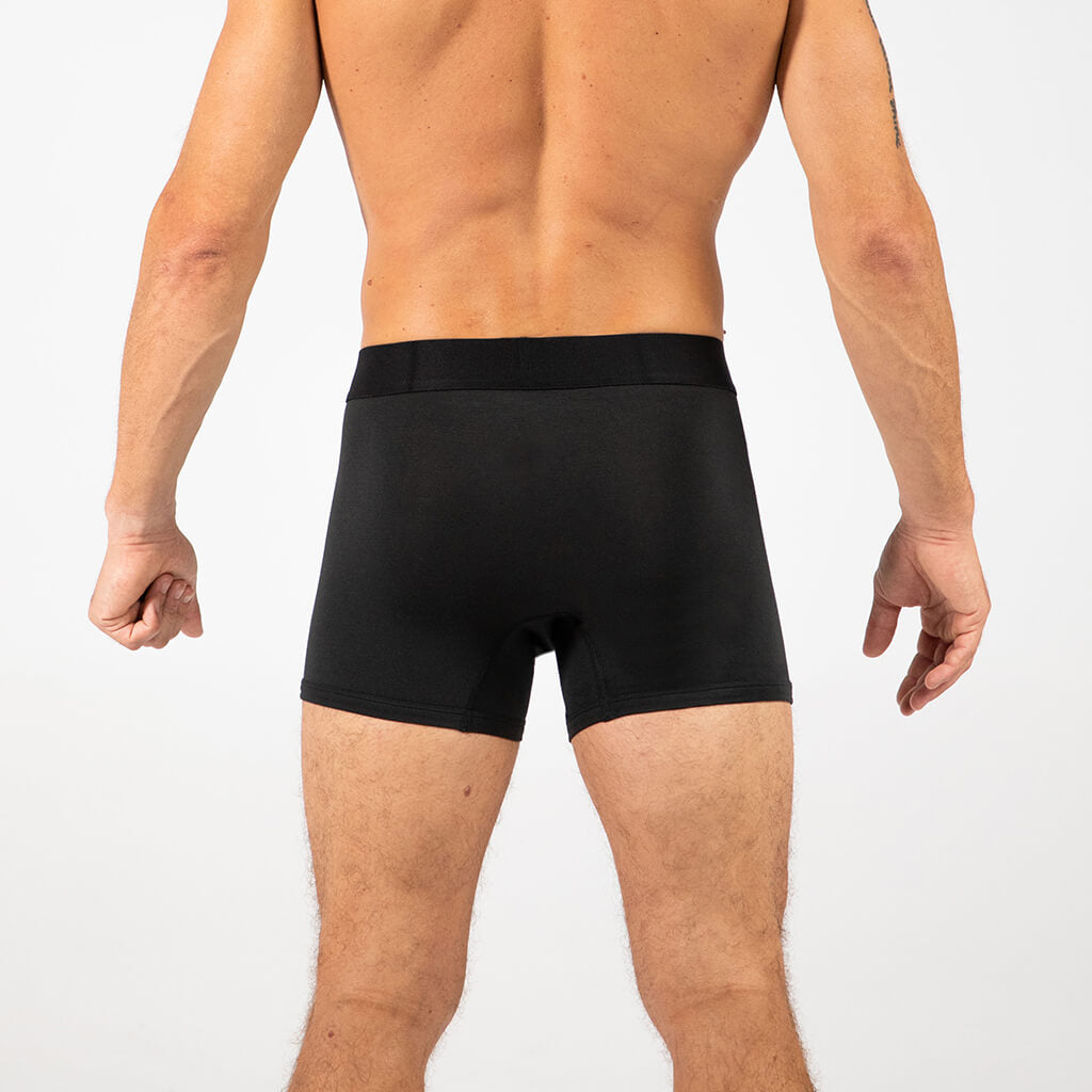 Man wearing Debriefs mens boxer briefs underwear - black rear